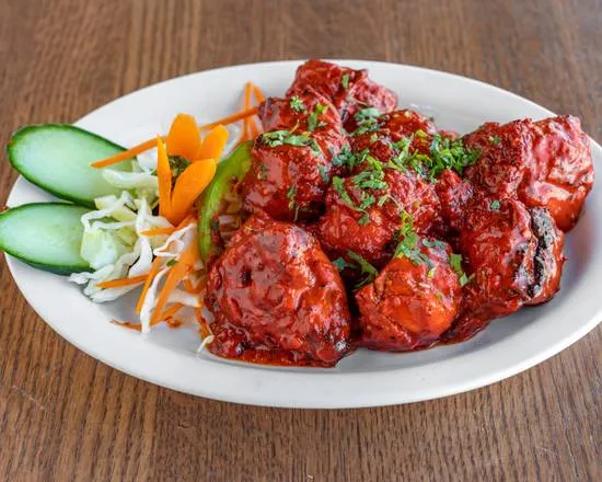 Butter Chicken Rice Bowl at 5 O Clock Cafe And Lounge, Calgary NE
