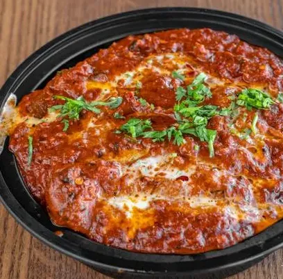 Calzone with marinara at 5 O Clock Cafe And Lounge, Calgary NE
