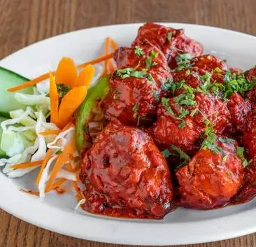 Butter Chicken Rice Bowl at 5 O Clock Cafe And Lounge, Calgary NE